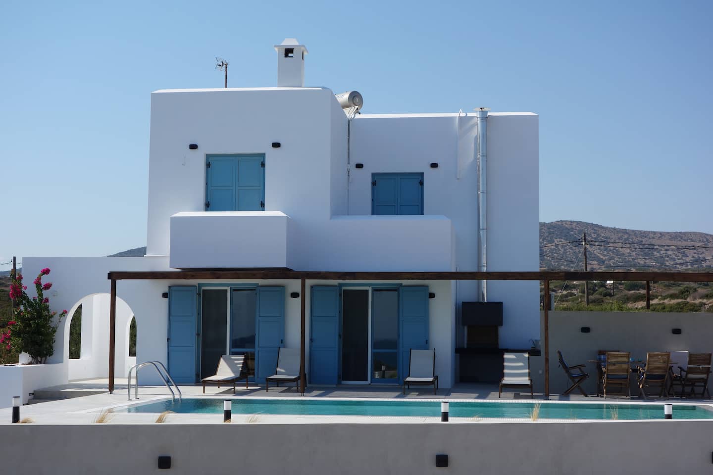 Villa Ilios in Lachania, Rhodes — white Greek villa with blue shutters and a private pool